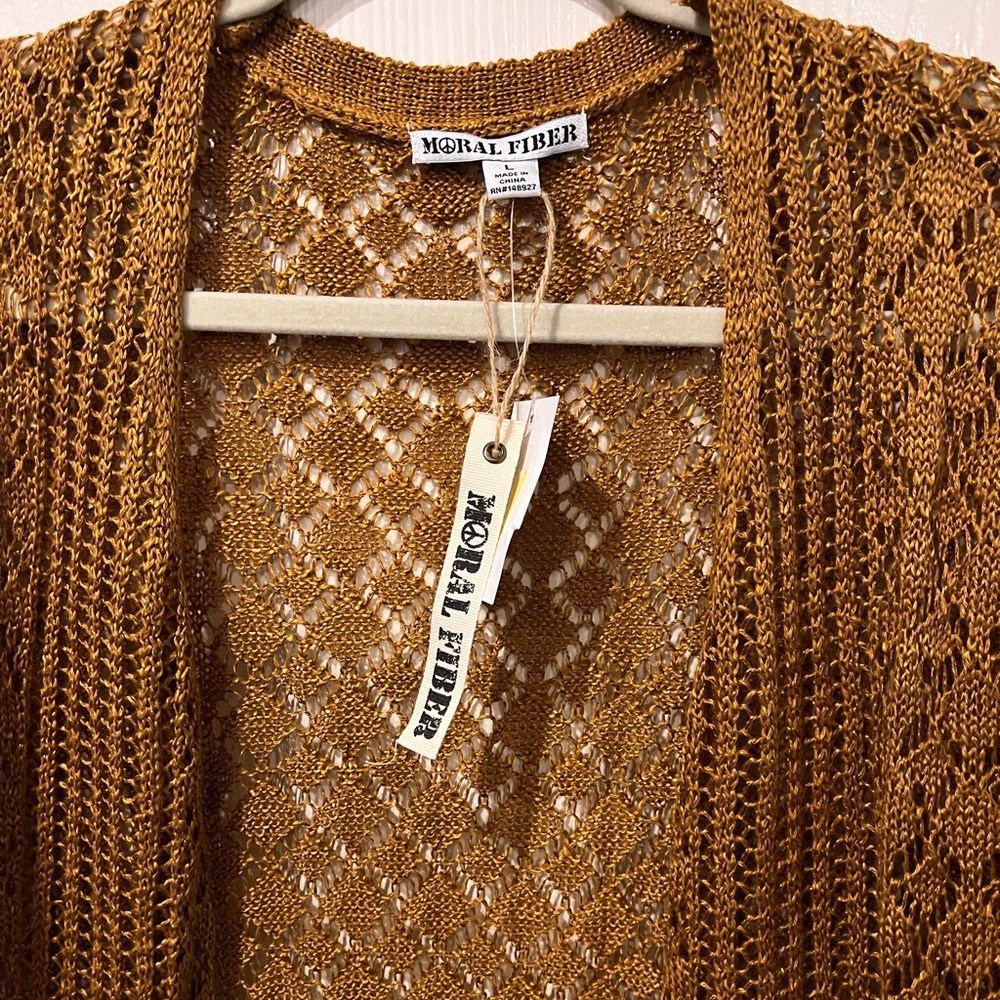 MORAL FIBER Crochet open weave long sleeve duster like sweater.